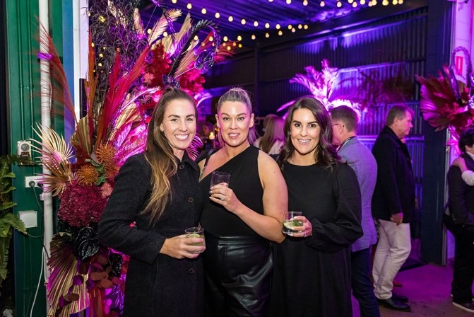 A group of women holding drinksDescription automatically generated with medium confidence